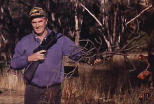 Only with a .22 can you have this sort of fun. Author’s Contender Carbine with .22 Match barrel was used to shoot these large mistletoe plants off a camp shade tree, which was being killed by the big parasitic plants. What a trophy!