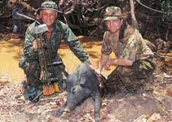 Jake Goodwin, on the right, congratulates Bob on taking his first feral pig with a bow