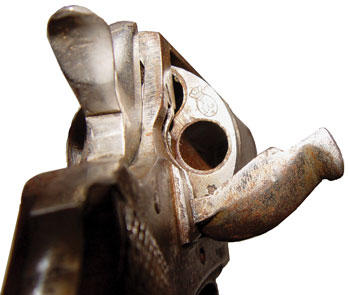 Open sidegate on a small solid frame Belgian .320 revolver