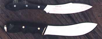 Classic sports knife (top) Canadian-made DH Russell R4 and a traditional trade skinner-style (bottom) hand-crafted by full-time knifemaker Simon Jurkijevic of the Northern Territory.