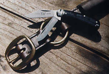 Lockable folding hunters, top to bottom: Model R380S Grohmann-Canada, model 1189 Ka-Bar-USA, and lightweight model 3005 tactical-type Ka-Bar-USA with belt clip.