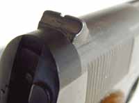 The rear-sight of the 1911 was a standard notched fixed style